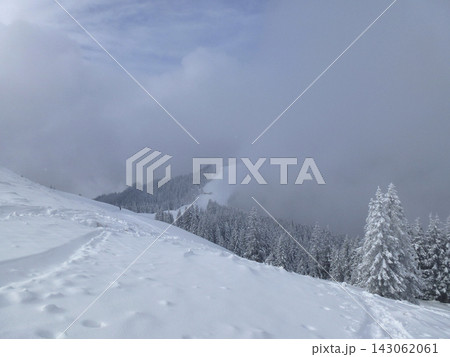 Snowy landscape at Hornle Mountain, alpine foothills in Bavaria, Germany Snowy landscape at Hornle Mountain, alpine foothills in Bavaria, Germany 143062061