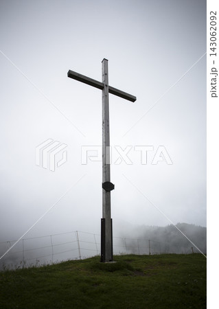 Summit cross Mittleres Hornle mountain in Bavaria, Germany 143062092