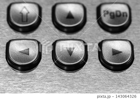 Close-up black and white photo of metal navigation buttons Close-up black and white photo of metal navigation buttons 143064326