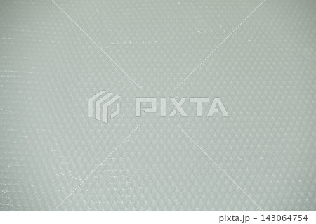 透明な気泡緩衝材の円形パターンを全面に写した背景写真として使える高解像度素材 透明な気泡緩衝材の円形パターンを全面に写した背景写真として使える高解像度素材 143064754