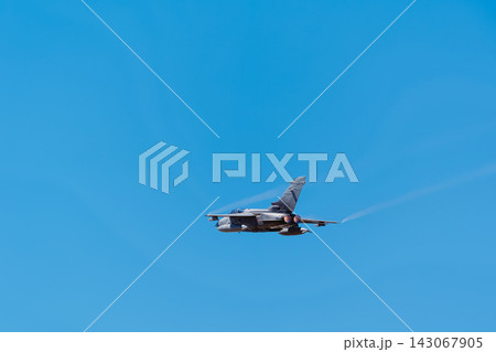 Military jet fighter plane in flight Military jet fighter plane in flight 143067905