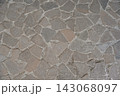 Irregular natural stone pavement with geometric mosaic texture and pattern 143068097
