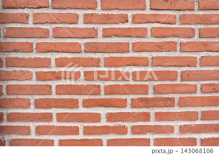 Regular red brick wall with clean geometric architectural pattern and texture 143068106