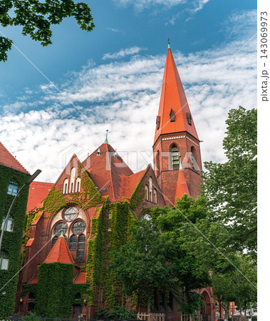 Historic Red Brick Church with Tall Spire and Ivy Historic Red Brick Church with Tall Spire and Ivy 143069973