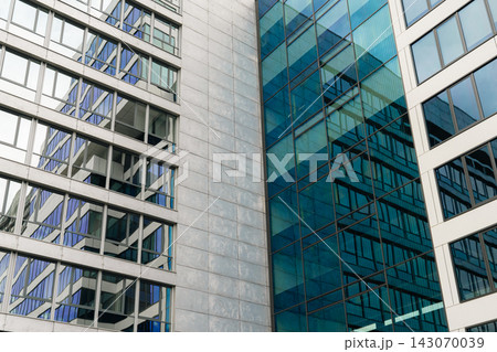 Modern Office Architecture with Abstract Glass Reflections Modern Office Architecture with Abstract Glass Reflections 143070039