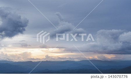 Beautiful landscape of mountain range during sunrise morning dawn. Mountain peaks with cloud and sunlight at dawn. Chiang Mai, Thailand. Beautiful landscape of mountain range during sunrise morning dawn. Mountain peaks with cloud and sunlight at dawn. Chiang Mai, Thailand. 143070776