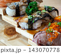 Set of eel sushi and burned beef sushi on a wooden tray in japanese restaurant. Japanese food. 143070778