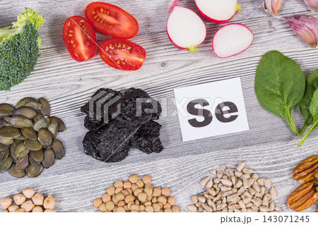 Healthy food and various ingredients containing natural selenium and other vitamins and minerals Healthy food and various ingredients containing natural selenium and other vitamins and minerals 143071245