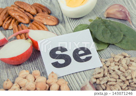 Healthy food and various ingredients containing natural selenium and other vitamins and minerals Healthy food and various ingredients containing natural selenium and other vitamins and minerals 143071246