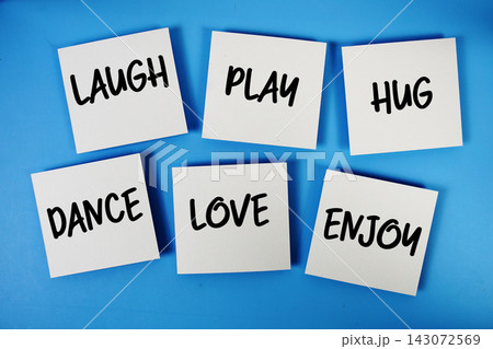 Happiness concept : Laugh, Play, Hug, Dance, Love, Enjoy message written on paper notes 143072569