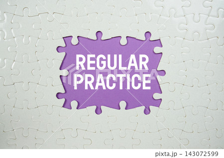 Jigsaw puzzle with a missing piece with "Regular Practice" on purple background 143072599