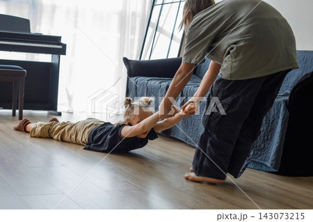 Attractive kids boy and girl playing. Fun and bonding of family growth Attractive kids boy and girl playing. Fun and bonding of family growth 143073215