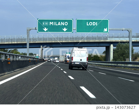 Road signs directing to Milano and Lodi 143073627
