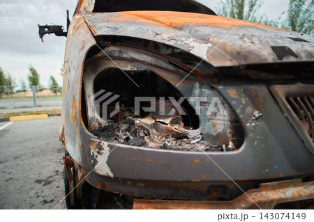 Destroyed Empty Headlight Socket of a Burned Car Close Up 143074149