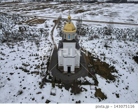 Aerial view of Orthodox church and cemetery in rural Belarus Aerial view of Orthodox church and cemetery in rural Belarus 143075116