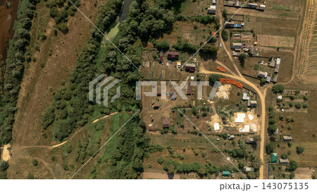 Aerial View of Rural Landscape with River and Settlement in Belarus Aerial View of Rural Landscape with River and Settlement in Belarus 143075135