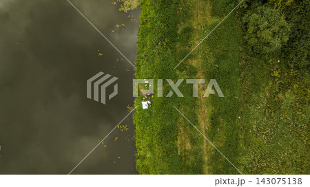 Aerial View of Riverside Area with Green Fields Near Minsk, Belarus 143075138