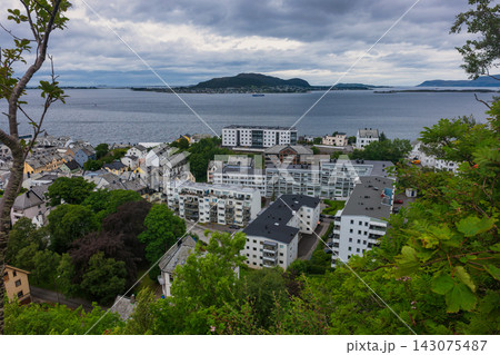 Aerial view of coastal town with modern apartments and fjord, Norway Aerial view of coastal town with modern apartments and fjord, Norway 143075487