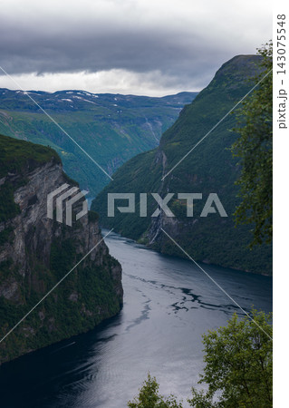 Deep valley canyon with river and waterfall, Norway fjord landscape Deep valley canyon with river and waterfall, Norway fjord landscape 143075548