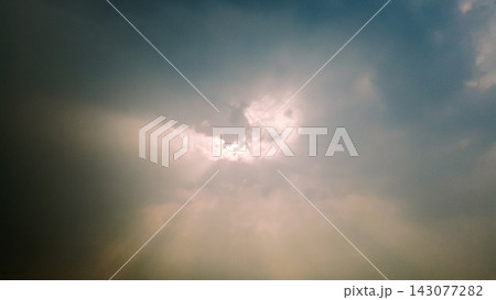 Dramatic Sunbeams Breaking Through Dark Storm Clouds Dramatic Sunbeams Breaking Through Dark Storm Clouds 143077282