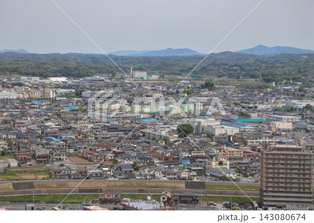 April 30 2026 Koriyama city skyline with mountains under overcast sky 143080674