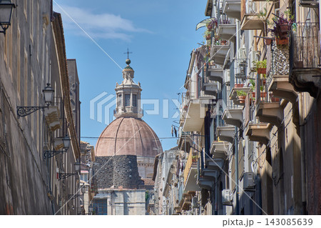 Via Crociferi in Catania with the beautiful dome of Sant'Agata in the background in Sicily Via Crociferi in Catania with the beautiful dome of Sant'Agata in the background in Sicily 143085639