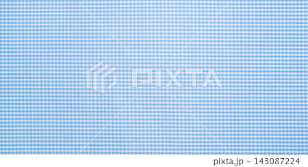 A textured background made of blue checkered fabric 143087224