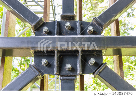 Bolted steel beam connection in structural frame Bolted steel beam connection in structural frame 143087470