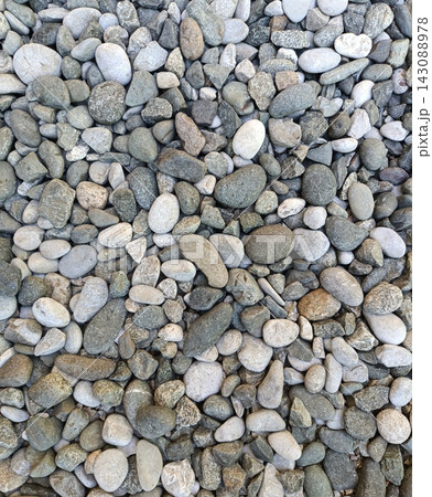 Natural river stones and smooth pebbles background texture  143088978