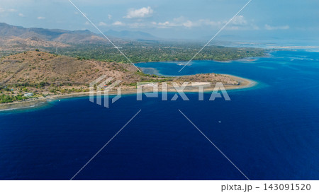 Bali with blue ocean and mountains in Pemuteran area, above view Bali with blue ocean and mountains in Pemuteran area, above view 143091520