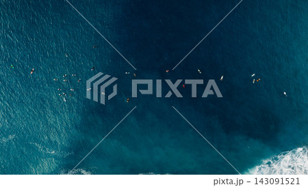 Drone view of perfect surf break over a tropical coral reef Drone view of perfect surf break over a tropical coral reef 143091521