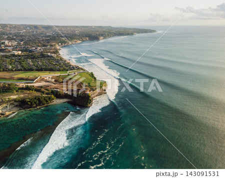 Aerial view of a long coastline with beaches and surfing waves Aerial view of a long coastline with beaches and surfing waves 143091531