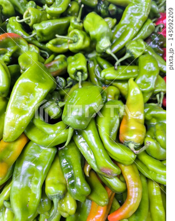 Bright and juicy close-up of ripe peppers on the counter 143092209
