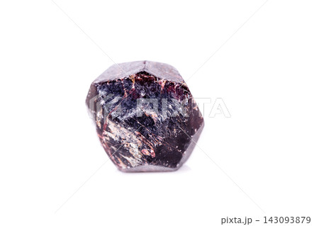 Macro of a mineral garnet stone on a white background Macro of a mineral garnet stone on a white background 143093879
