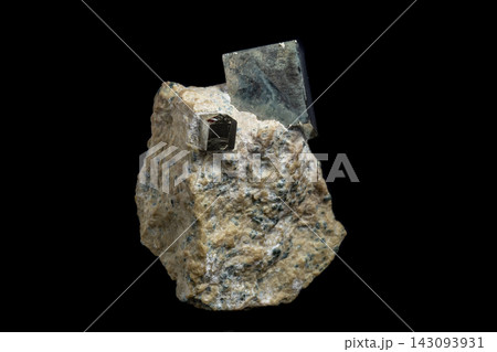 Macro Pyrite mineral stone on black background Macro Pyrite mineral stone on black background 143093931