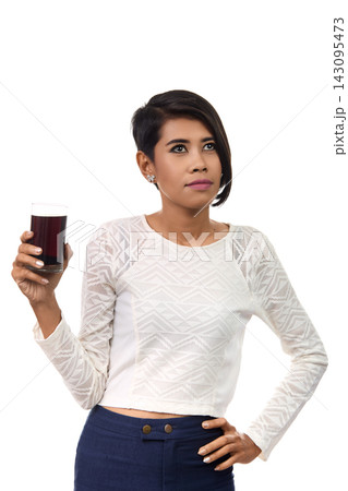 Emotional Asian Woman Holding Cola in Studio Portrait Emotional Asian Woman Holding Cola in Studio Portrait 143095473