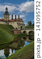 A view of Nesvizh Castle, the bridge, and the moat with water. Belarus 143095752