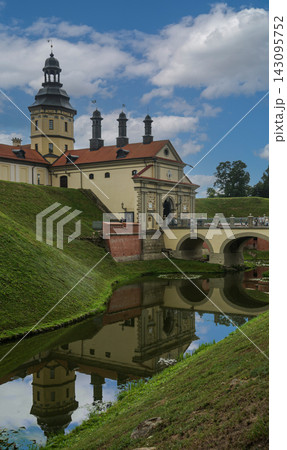 A view of Nesvizh Castle, the bridge, and the moat with water. Belarus 143095752