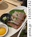 Korean soy sauce marinated raw salmon with sesame seeds and wasabi 143097142