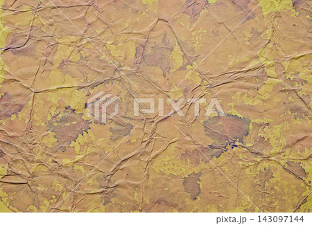 Distressed Earthy Color Paper Background With Creases and Purple Accents Distressed Earthy Color Paper Background With Creases and Purple Accents 143097144