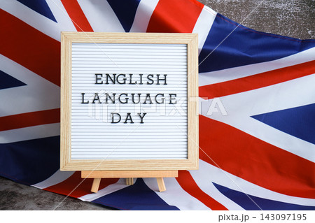 Message ENGLISH LANGUAGE DAY on background of Great Britain UK flag. British national flag with concept of High school university college education, language courses, online distance learning Message ENGLISH LANGUAGE DAY on background of Great Britain UK flag. British national flag with concept of High school university college education, language courses, online distance learning 143097195