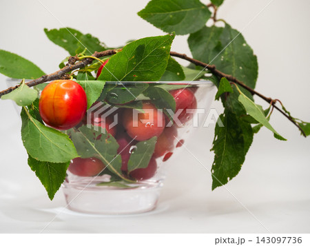 Ripe red cherries fruit in a bowl 143097736
