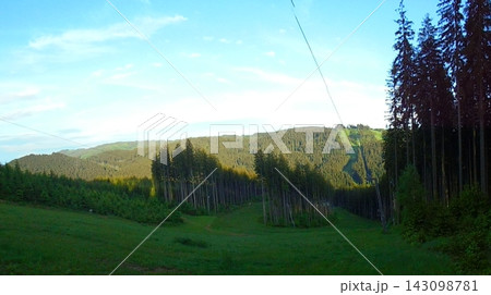 Beskydy landscape at sunset with green meadow and forests in background Beskydy landscape at sunset with green meadow and forests in background 143098781