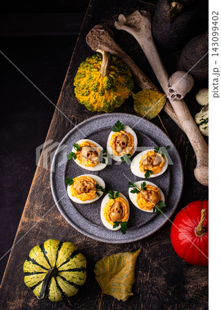 Deviled Eggs decorated with skull 143099402