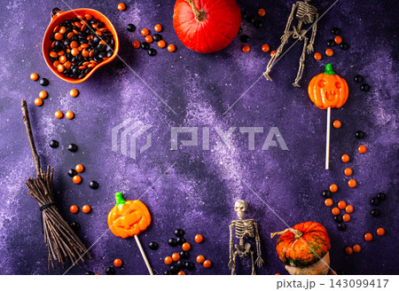 Halloween candy in shape of pumpkin jack-o-lantern Halloween candy in shape of pumpkin jack-o-lantern 143099417