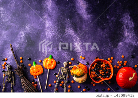 Halloween candy in shape of pumpkin jack-o-lantern Halloween candy in shape of pumpkin jack-o-lantern 143099418