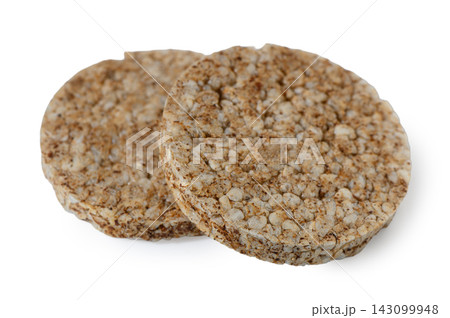 Two round whole grain rice cakes on a white background Two round whole grain rice cakes on a white background 143099948