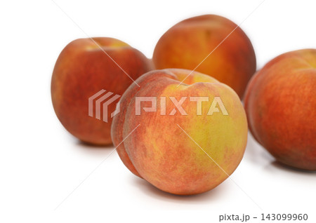 Commercial stock photo of fresh whole ripe peaches arranged on a white background Commercial stock photo of fresh whole ripe peaches arranged on a white background 143099960