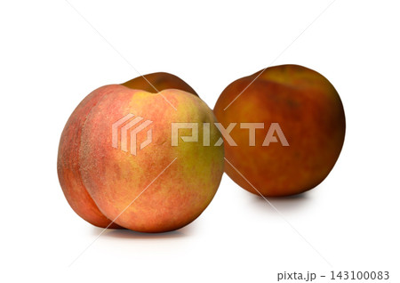 Commercial stock photo of two fresh whole ripe peaches against a clean white background Commercial stock photo of two fresh whole ripe peaches against a clean white background 143100083