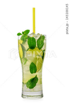 Tall glass of Mojito cocktail with lime, mint leaves, ice, and a yellow straw on a white background Tall glass of Mojito cocktail with lime, mint leaves, ice, and a yellow straw on a white background 143100145